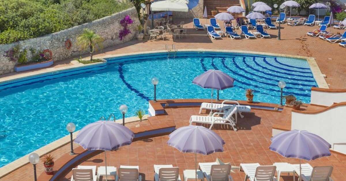 Een foto van het zwembad bij Grand Hotel Villa Politi