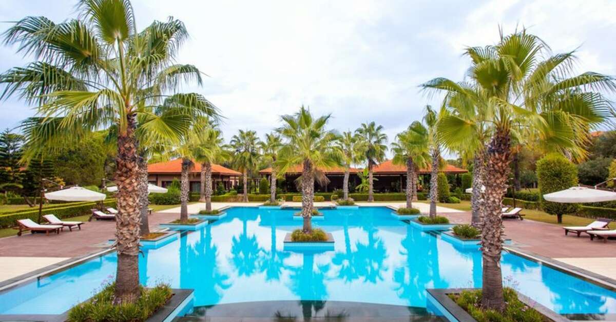 Een foto van het zwembad bij IC Hotels Residence