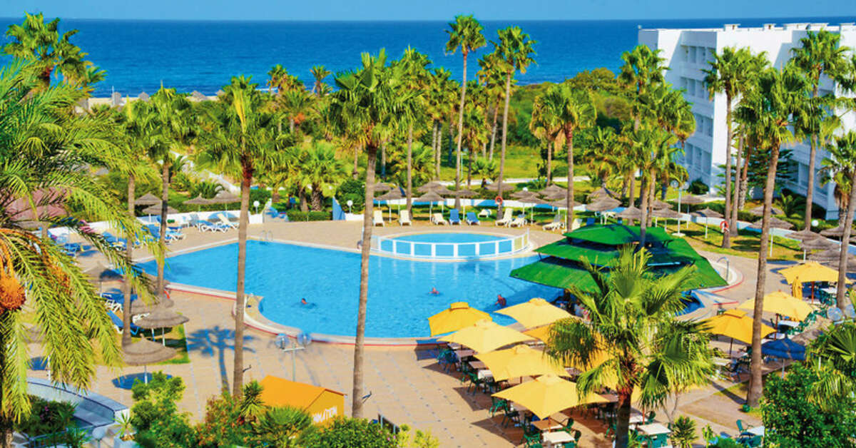 Een foto van het zwembad bij Hotel Club Tropicana & Spa