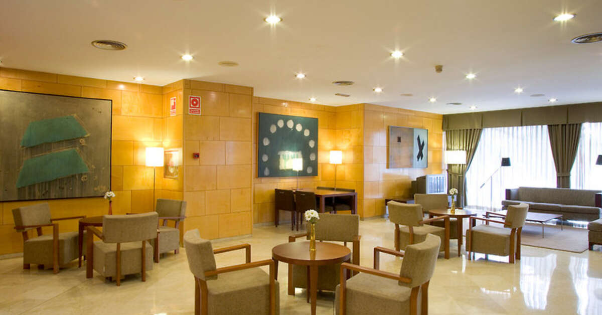 Een foto van het interieur van NH Ciudad de Valencia
