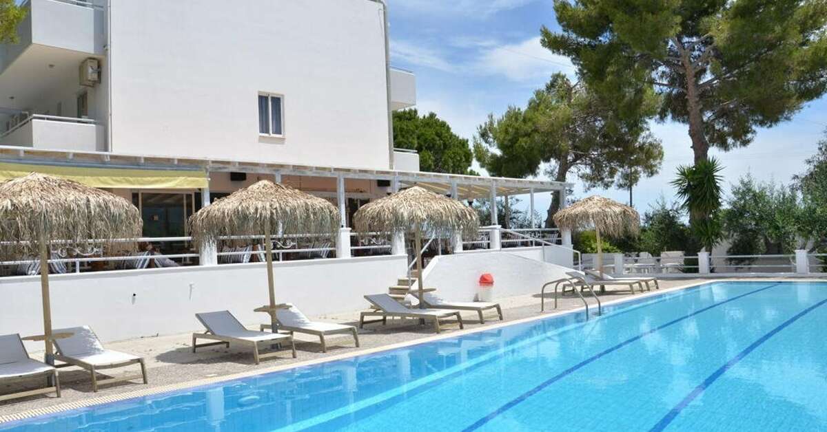 Een foto van het zwembad bij Blue Nest Hotel