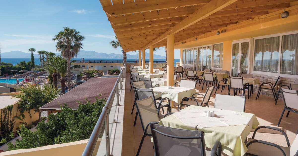 Een foto van het terras bij Euro Village Achilleas Hotel
