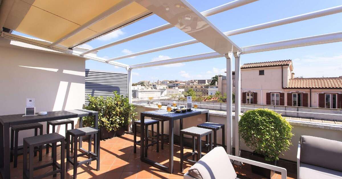 Een foto van het terras bij Rome Times Hotel