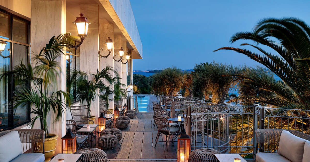 Een foto van het terras bij Corfu Imperial Grecotel Beach Luxe Resort