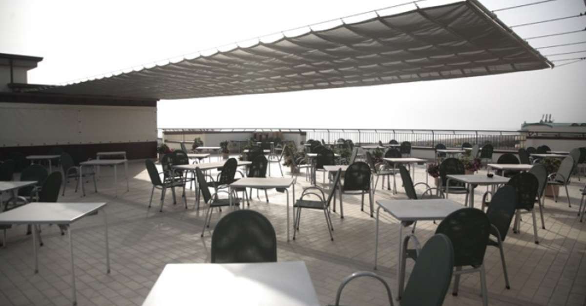 Een foto van het terras bij Club Hotel Dante