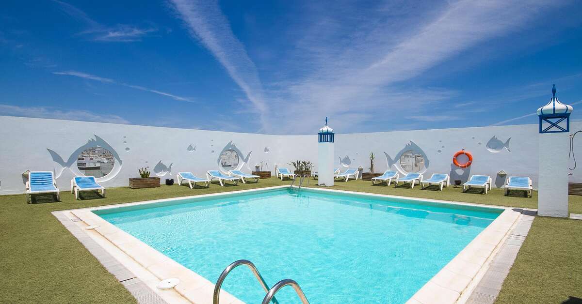 Een foto van het zwembad bij Hotel Lancelot