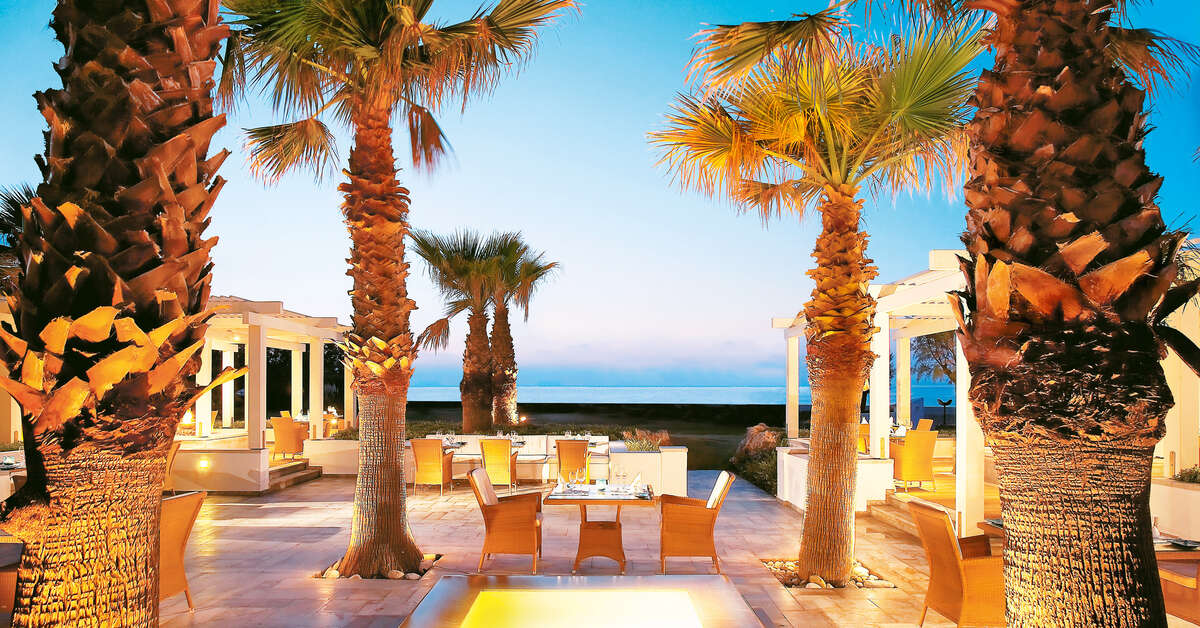 Een foto van het terras bij Grecotel Creta Palace