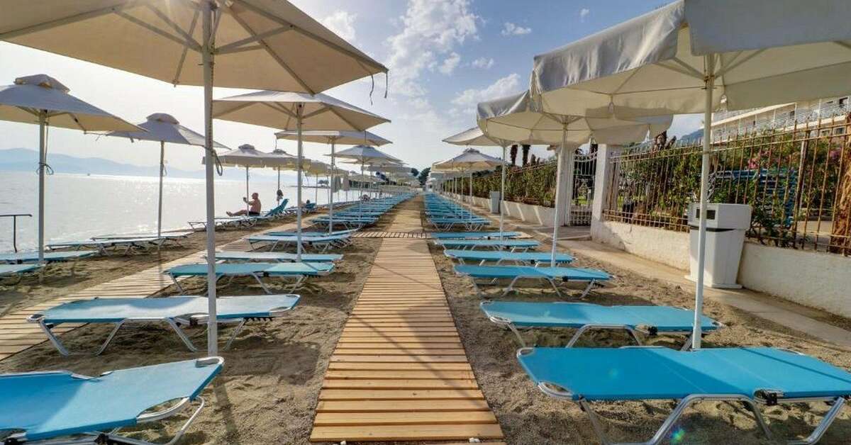 Een foto van het strand bij Calamos Beach Family Club Hotel