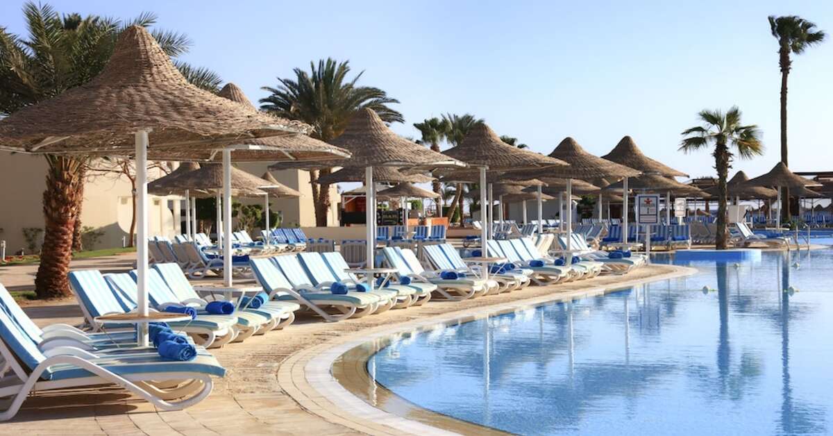 Een foto van het zwembad bij Jaz Palmariva Beach Resort