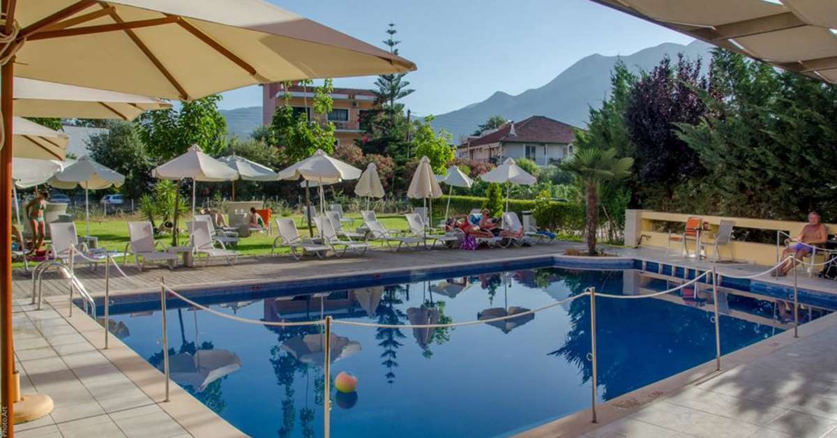 Een foto van het zwembad bij Hotel Palmyra Nidri