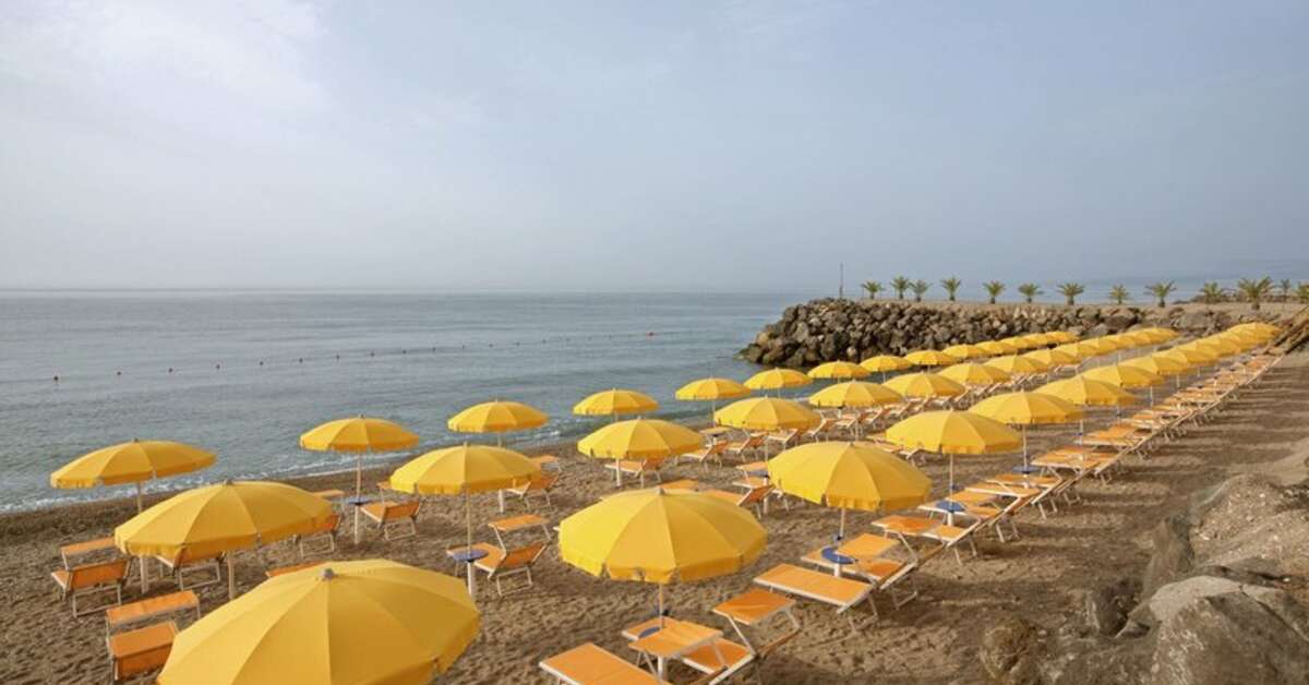 Ein Foto vom Strand beim Delta Hotels Giardini Naxos