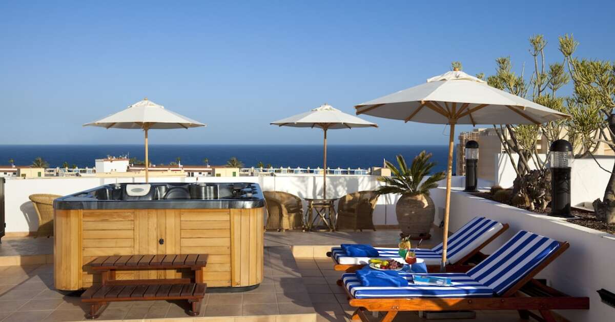 Ein Foto von der Terrasse im Seaside Sandy Beach