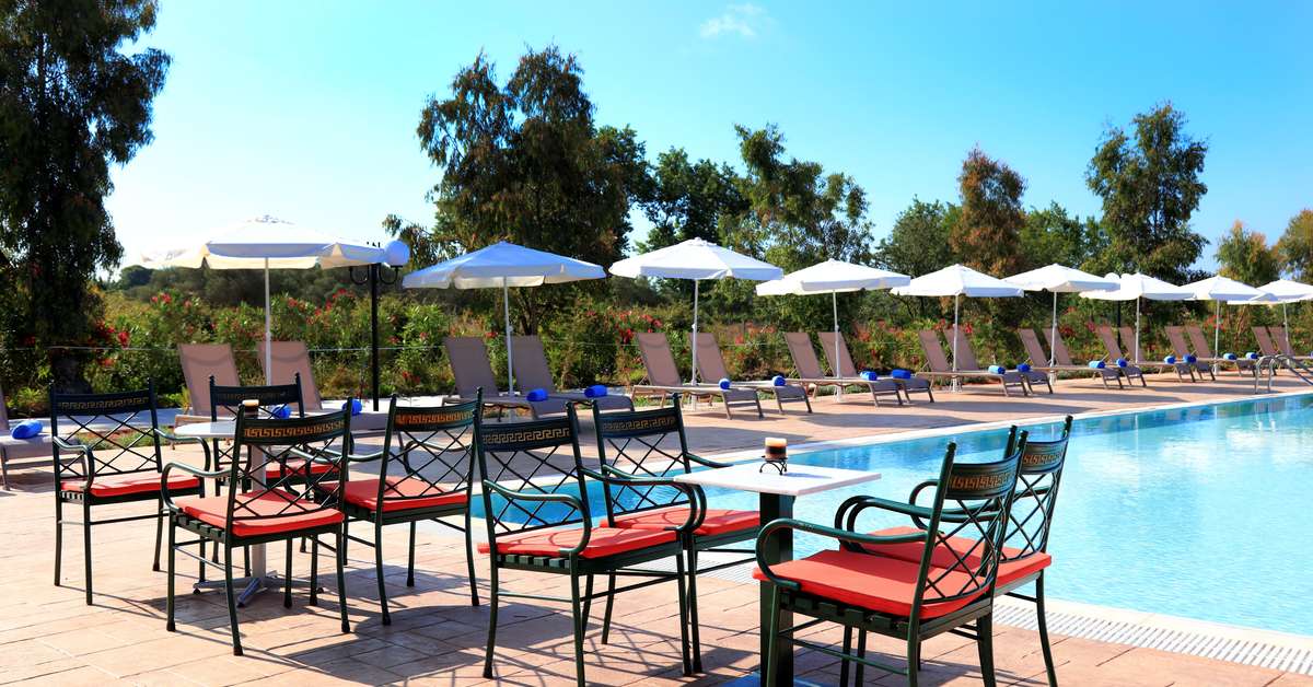 Een foto van het terras bij Sandy Beach & Villas