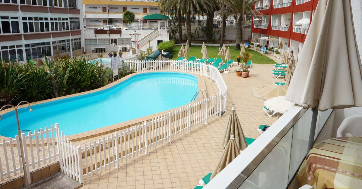 Een foto van het zwembad bij Appartementen Ecuador