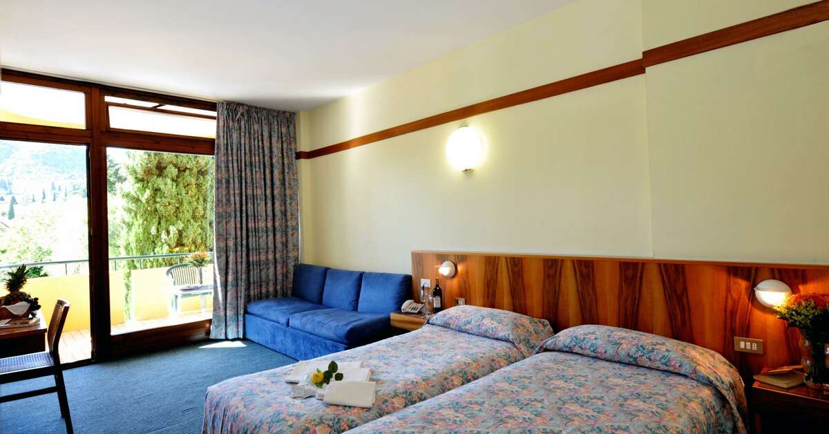 Ein Foto Hotel Palme Royal & Suite