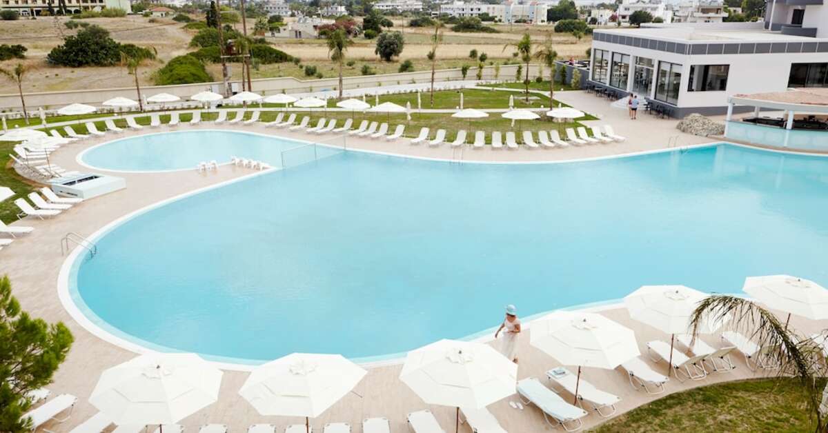 Een foto van het zwembad bij Evita Resort