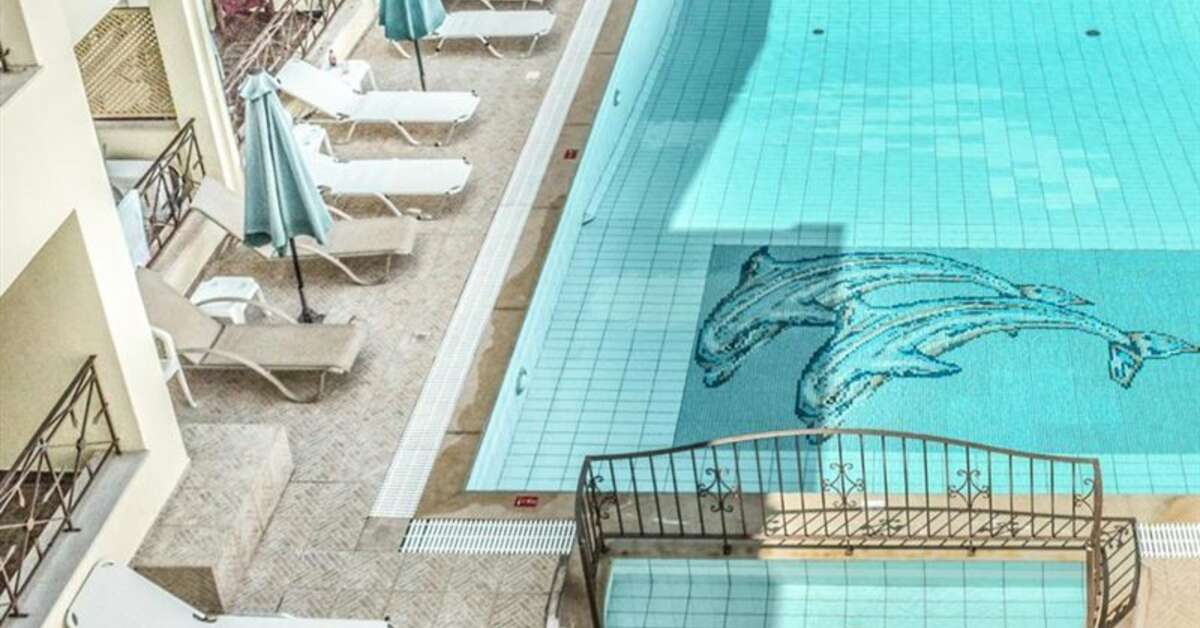 Een foto van het zwembad bij Alexandros Hotel