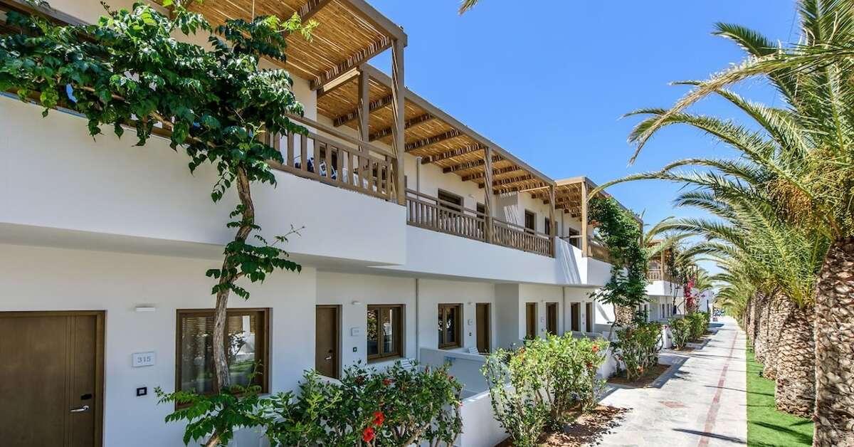 Een foto van de buitenkant van Stella Village Seaside Hotel