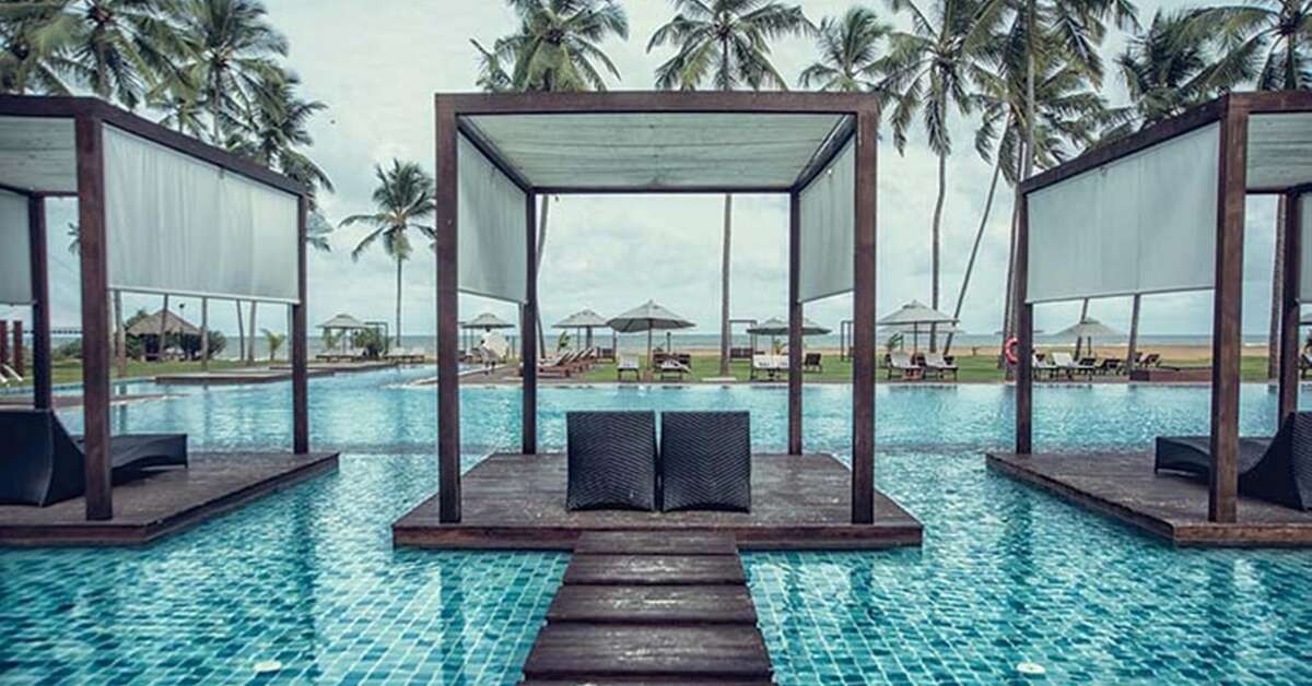 Een foto van het zwembad bij Suriya Luxury Resort