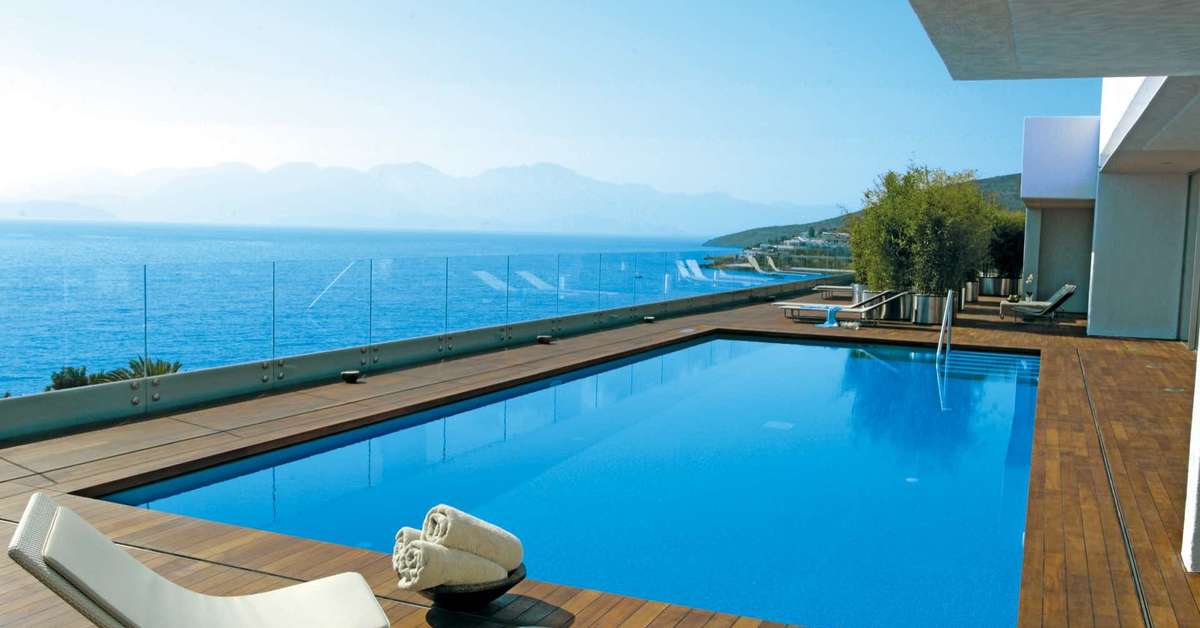 Een foto van het zwembad bij Elounda Beach Hotel & Villas