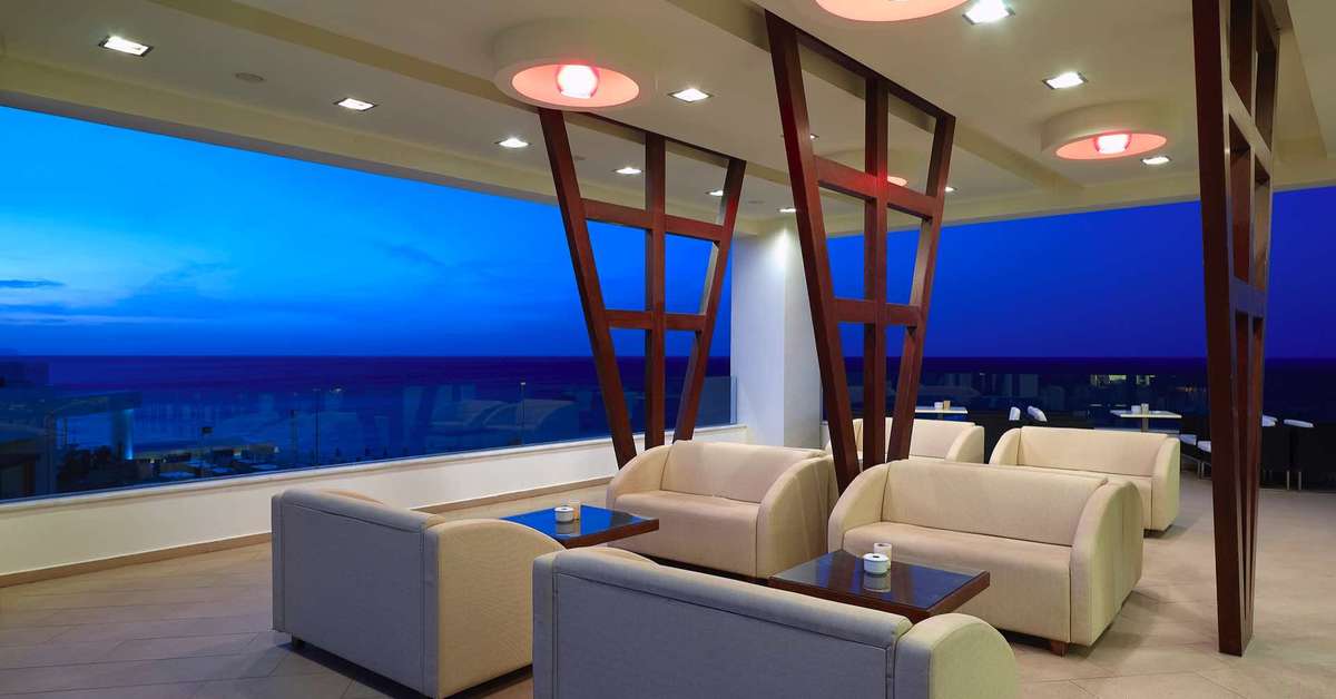 Een foto van het terras bij The Royal Blue Resort & Spa