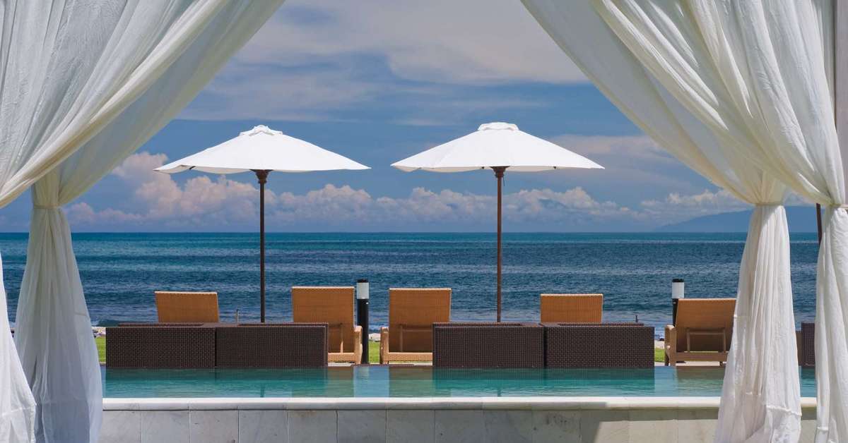 Een foto van het zwembad bij Bali Garden Beach Resort