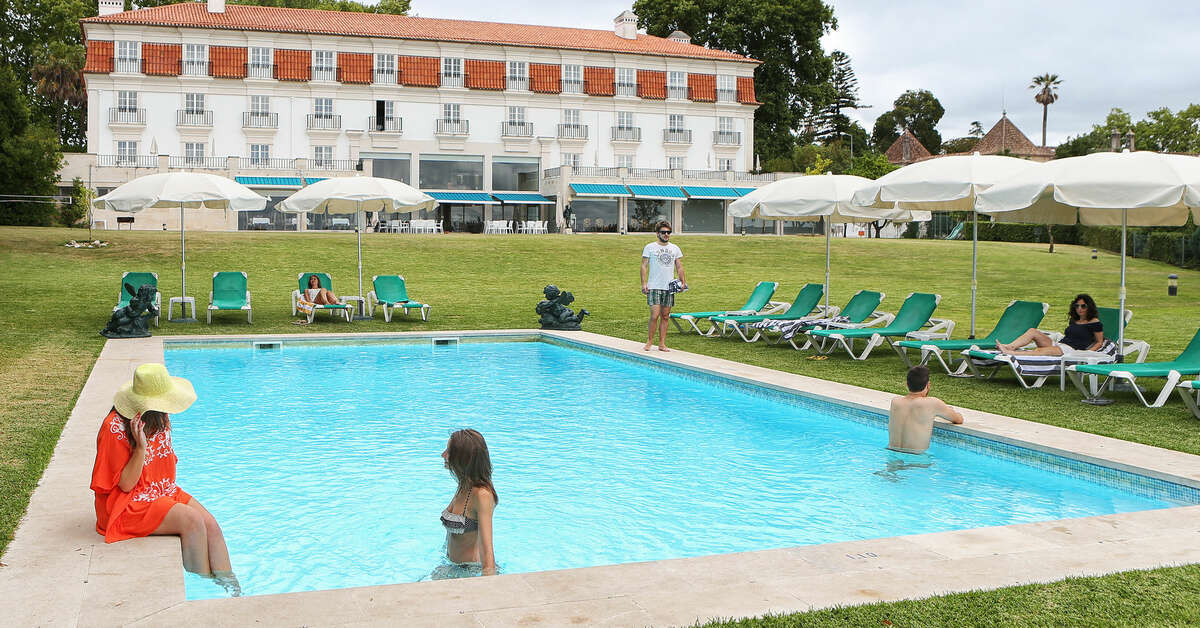 Een foto van het zwembad bij Conimbriga Hotel do Paco