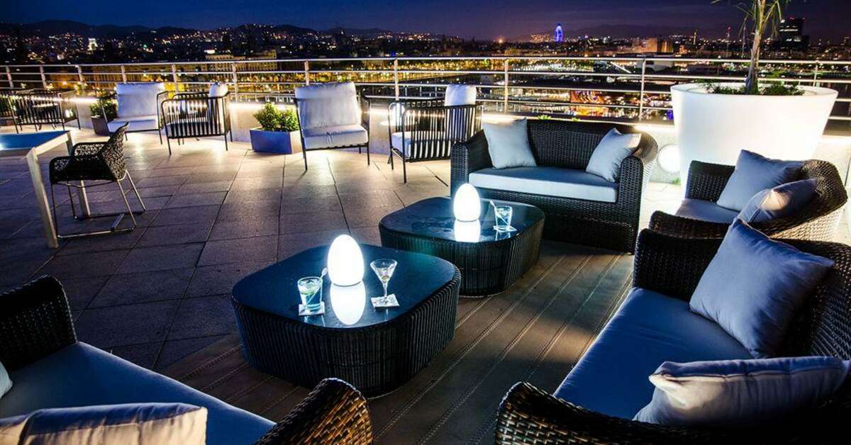 Een foto van het terras bij Eurostars Grand Marina Hotel