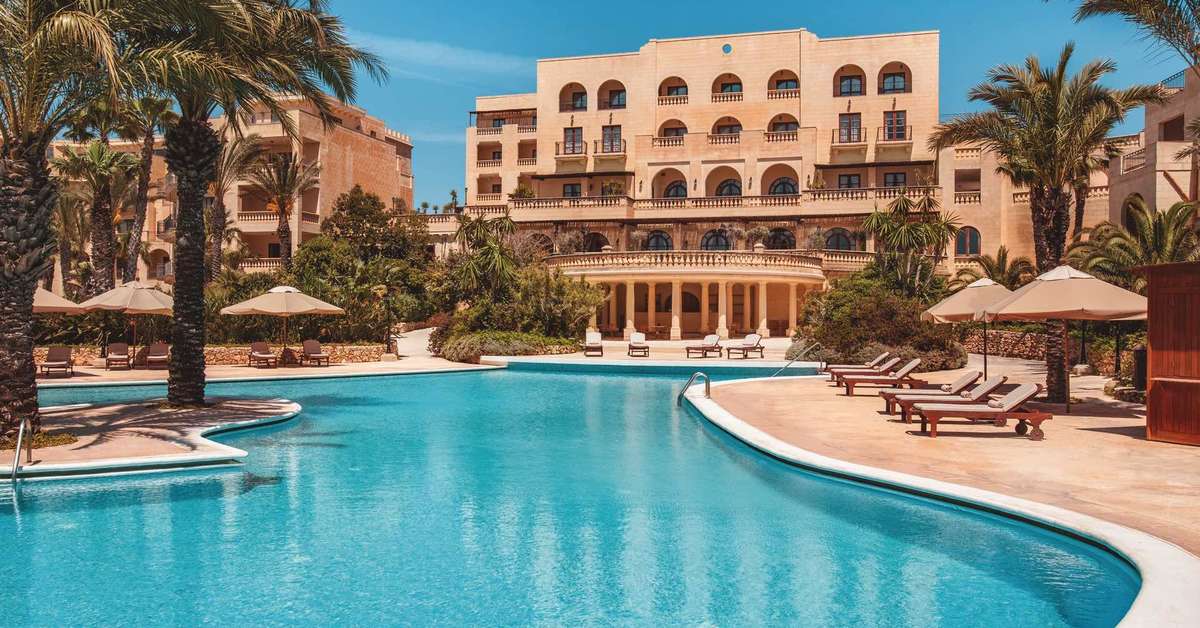 Een foto van het zwembad bij Kempinski San Lawrenz