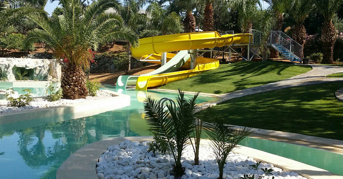 Een foto van het zwembad bij Out of the Blue Capsis Elite Resort