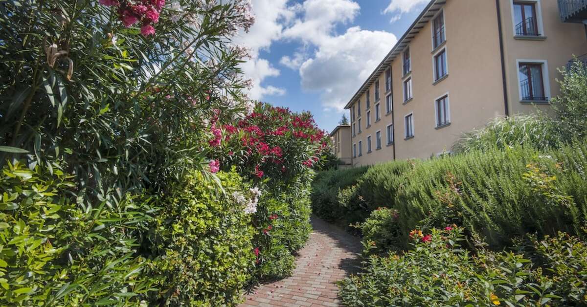 Een foto van de buitenkant van Hotel Villa Paradiso Village
