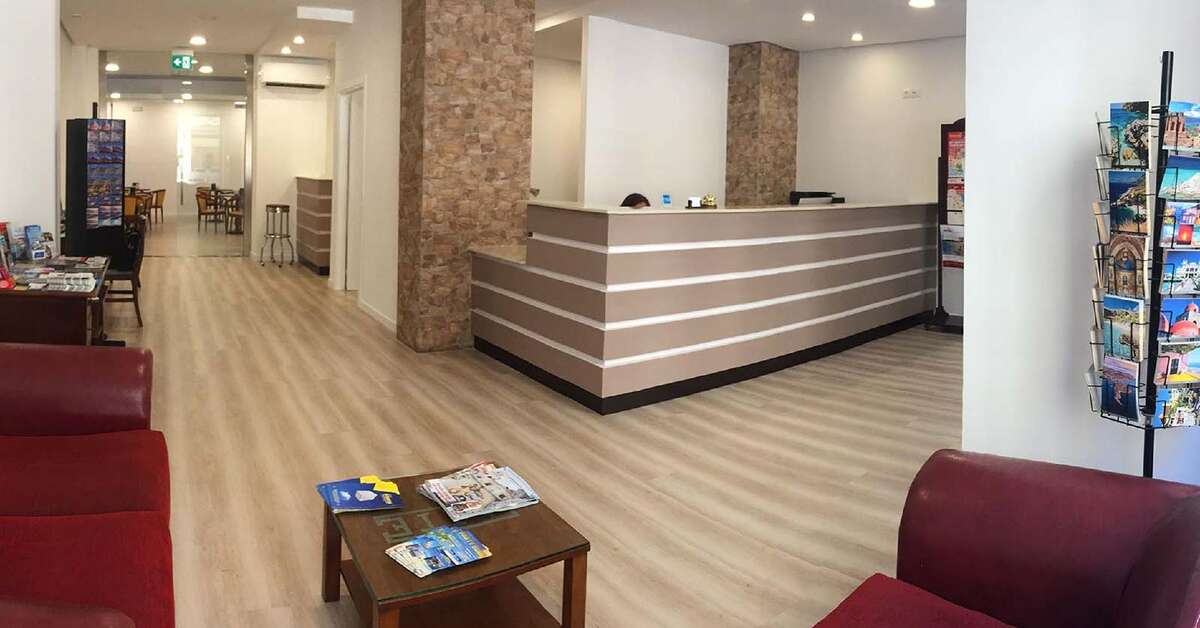 Een foto van het interieur van Elite Hotel Palermo