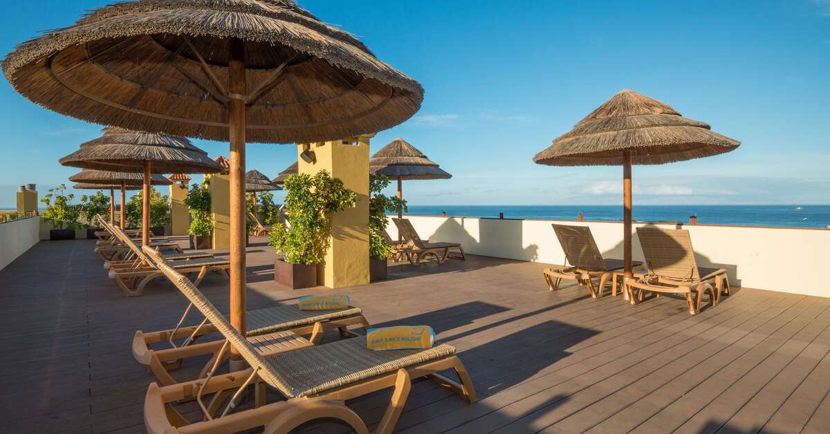 Een foto van het terras bij Hovima Jardin Caleta