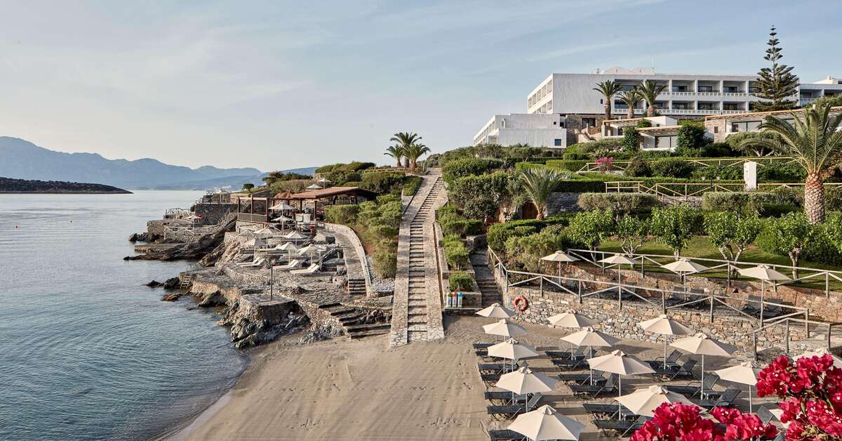 Een foto van het strand bij Minos Palace Hotel & Suites