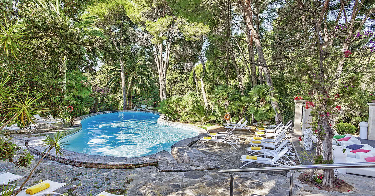 Een foto van het zwembad bij Hotel Lago Garden Suites & Spa