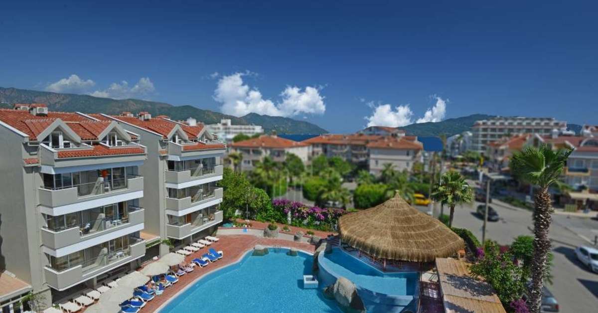 Een foto van het zwembad bij Begonville Hotel