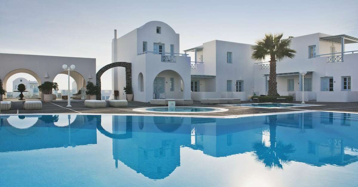 Een foto van het zwembad bij El Greco Resort & Spa