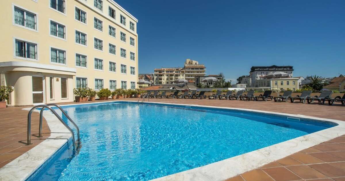 Een foto van het zwembad bij Vila Gale Estoril