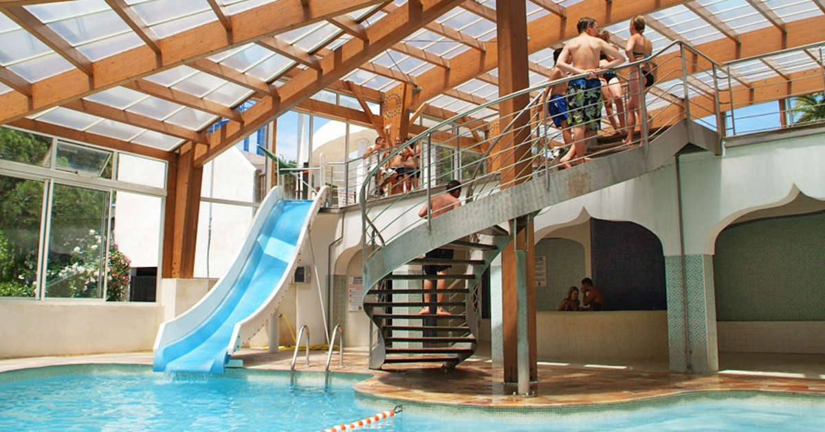 Een foto van het zwembad bij Camping La Baume - La Palmeraie