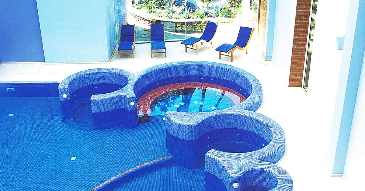 Een foto van het zwembad bij TH Tirrenia Green Park Resort