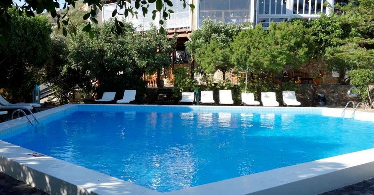 Een foto van het zwembad bij Cretan Village Hotel