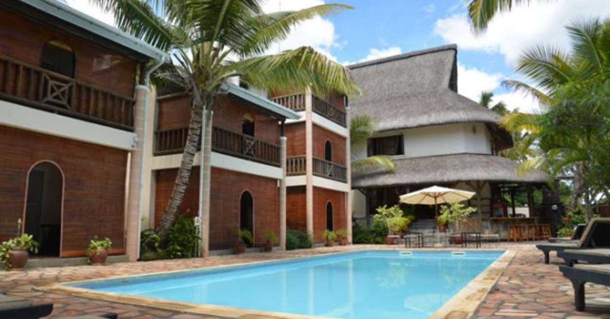 Een foto van het zwembad bij Le Palmiste Resort & Spa