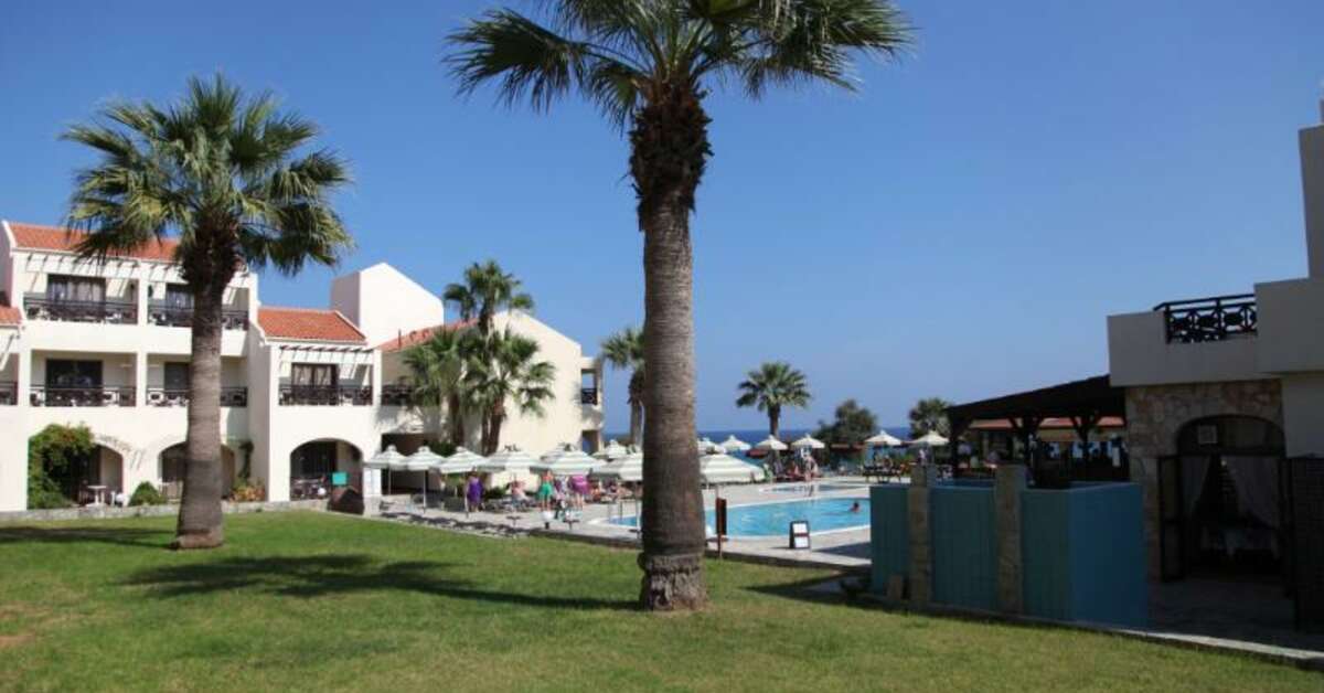 Een foto van het zwembad bij Hotel Mimosa Beach