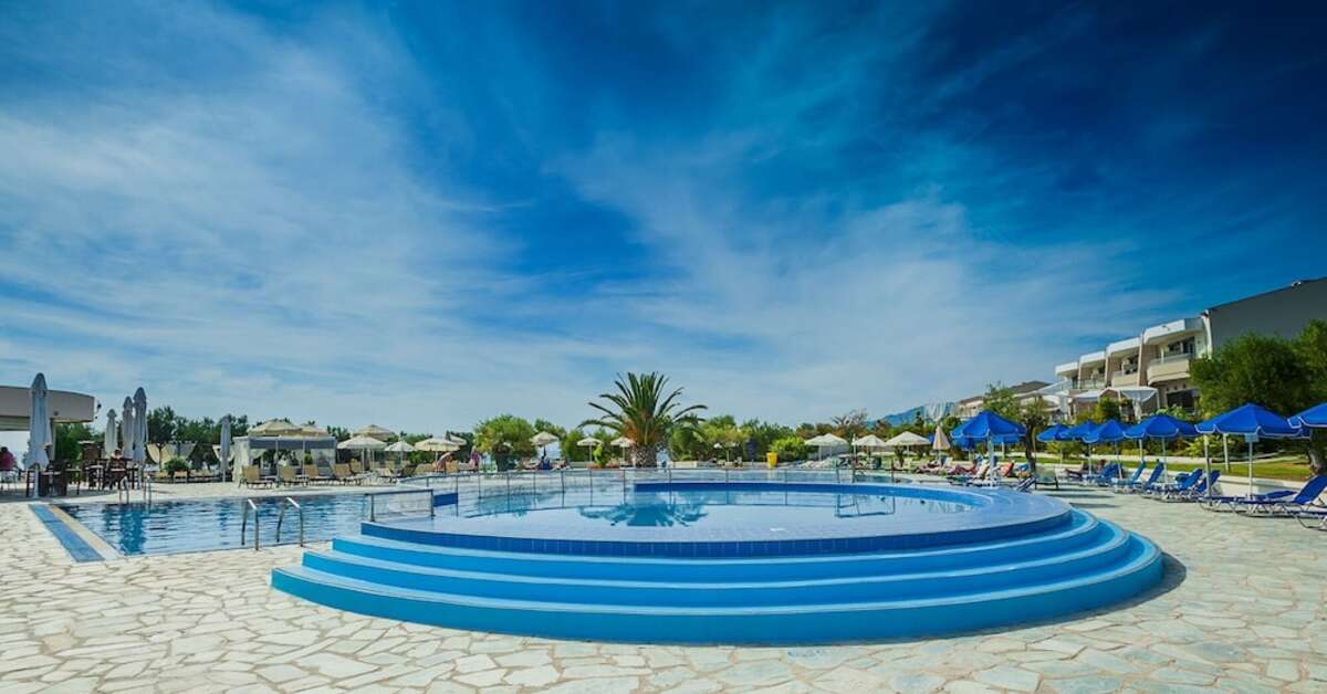 Een foto van het zwembad bij Xenios Anastasia Resort & Spa