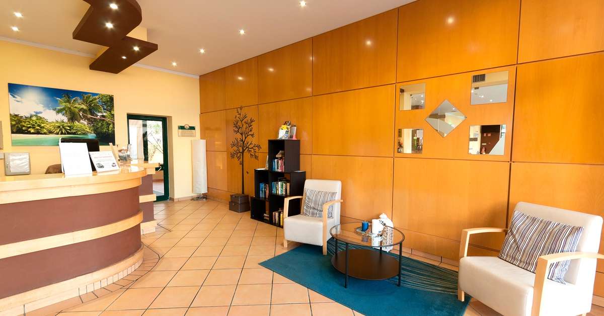 Een foto van het interieur van Plaza Real Aparthotel