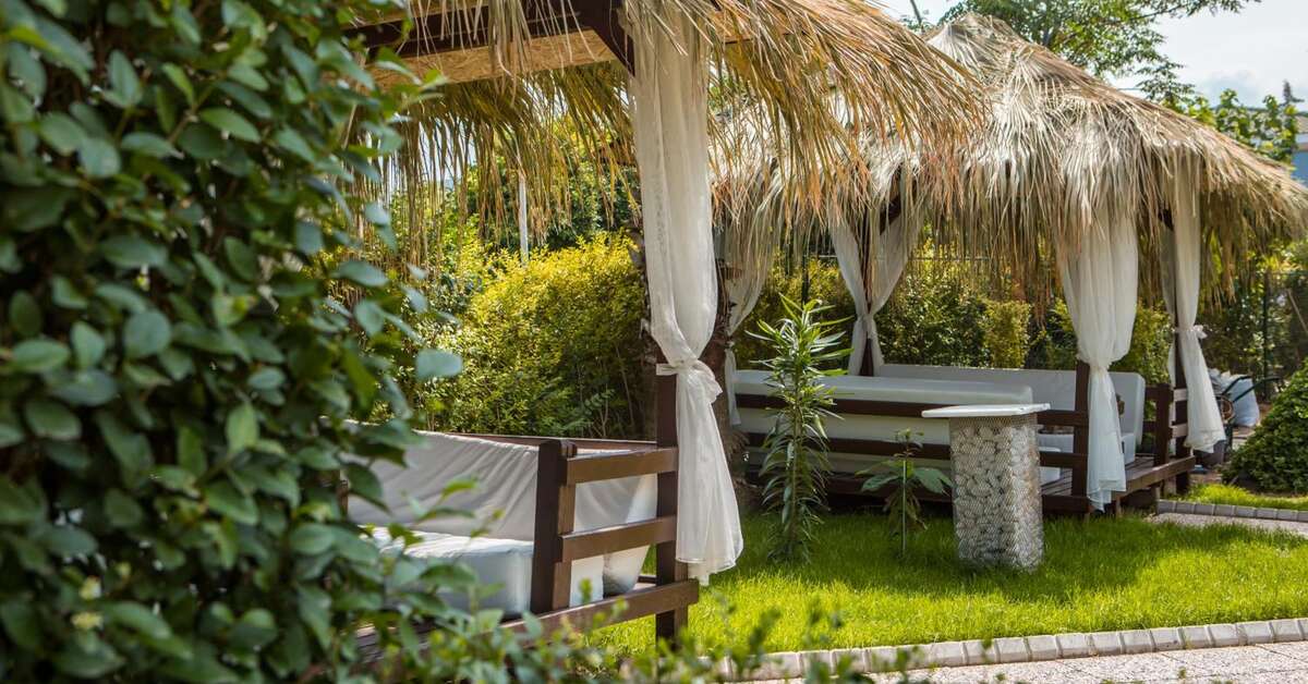 Een foto van het terras bij L'Ancora Beach