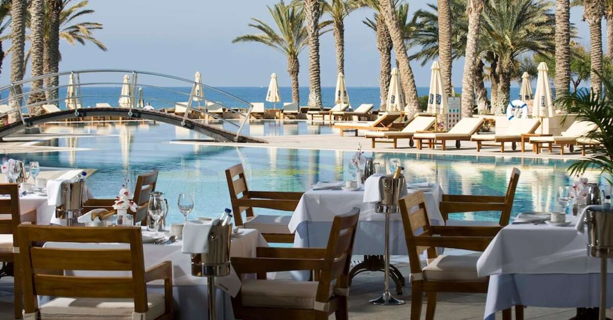 Een foto van het terras bij Constantinou Bros Asimina Suites Hotel
