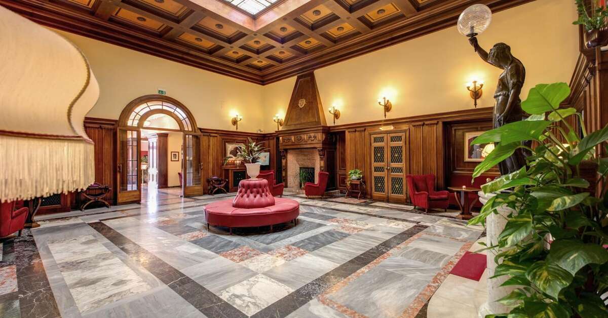Een foto van het interieur van Grand Hotel Villa Politi