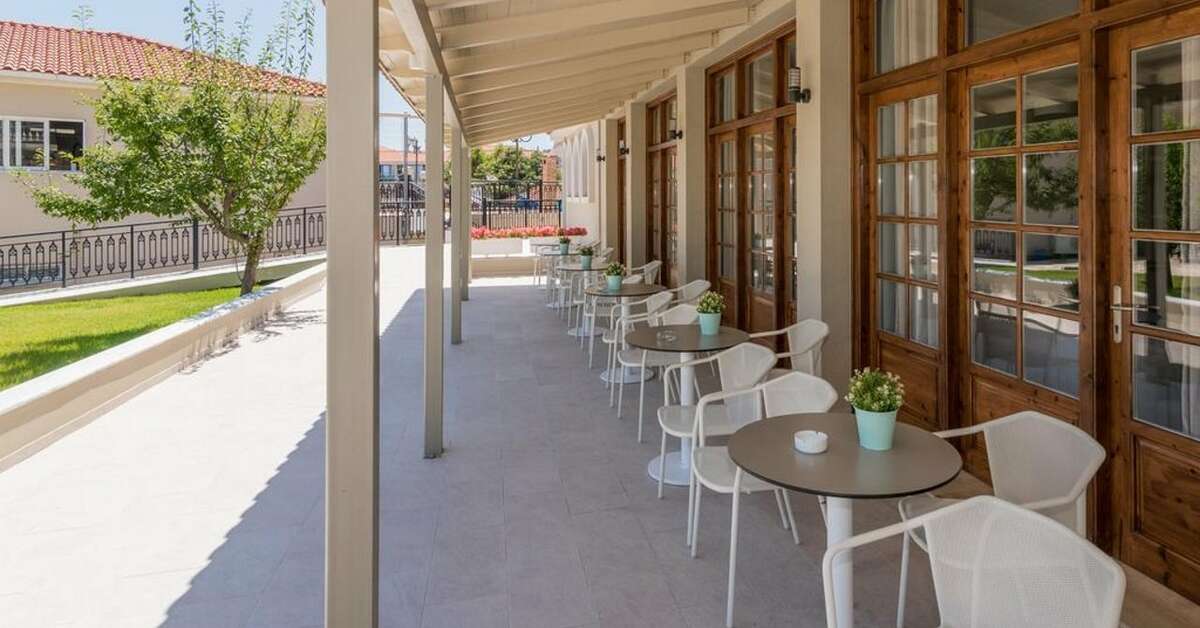 Een foto van het terras bij Hotel Palmyra