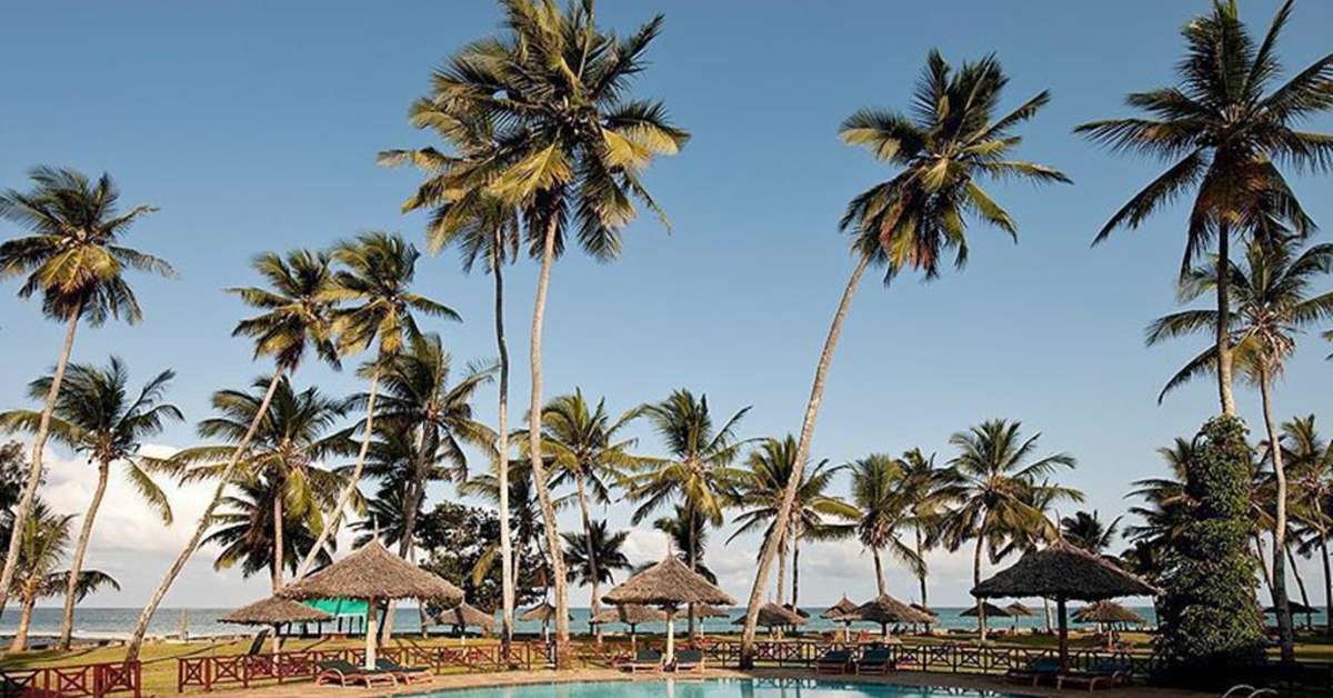 Een foto van het zwembad bij Neptune Village Beach Resort & Spa